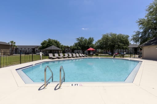 our apartments have a resort style pool with chairs