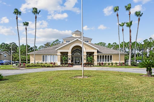 a building with a flagpole in front of it