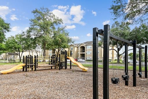 playground at the whispering winds apartments in pearland, tx