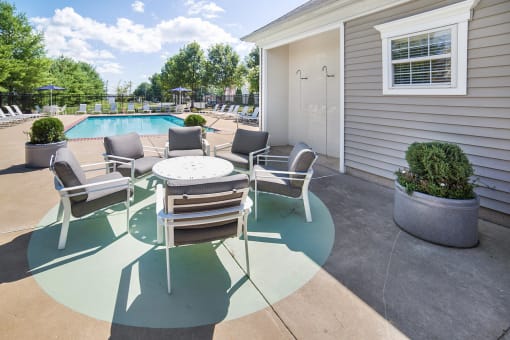 take a dip in the pool at the whispering winds apartments in pearland, tx