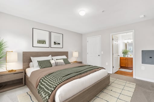 a bedroom with a bed and two night stands