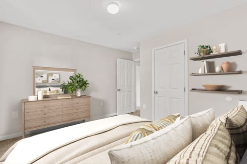 a bedroom with a bed and a dresser