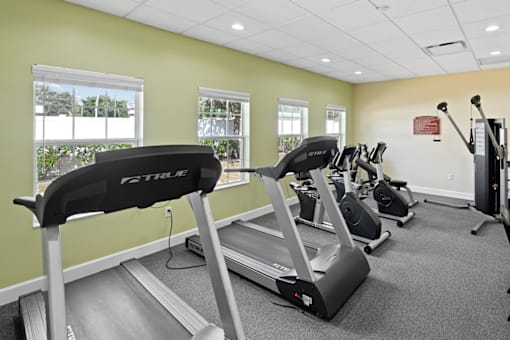 the gym at the enclave at woodbridge apartments in sugar land, tx