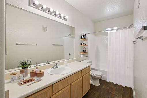 bathroom with a white sink at The Village at Sun Valley Apartments, Mesa, AZ