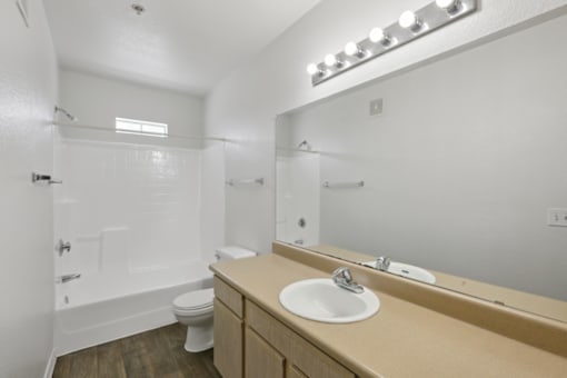 White sink in bathroom at The Village at Sun Valley Apartments, Mesa, 85207
