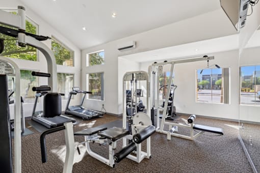 fitness center with equipment at The Village at Sun Valley Apartments, Mesa Arizona