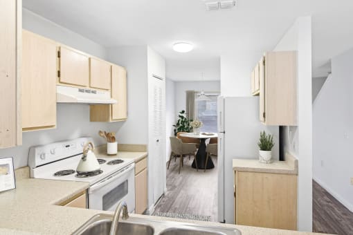 a kitchen and dining area in a 555 waverly unit
