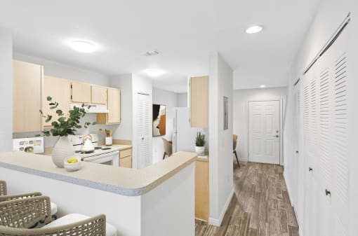 a kitchen and dining area in a 555 waverly unit