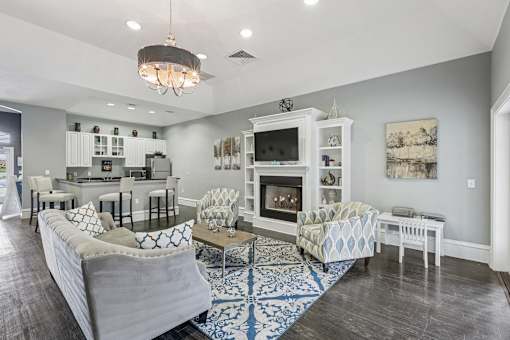A living room with a fireplace and a couch.