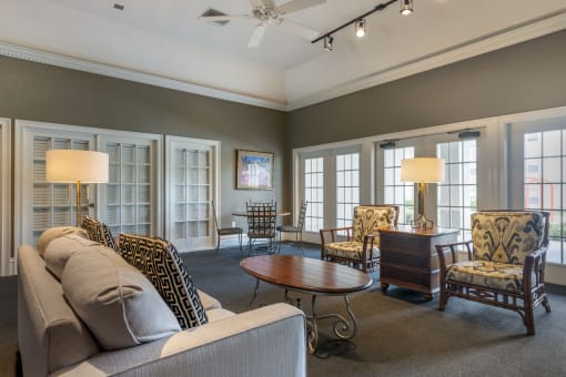 Community clubhouse filled with furniture and a large window
