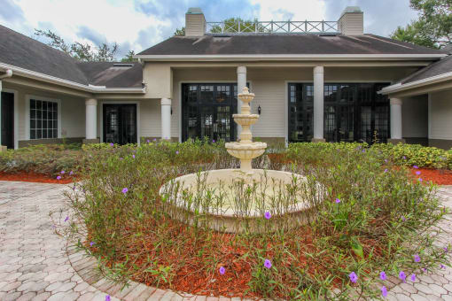 a fountain in front of a building