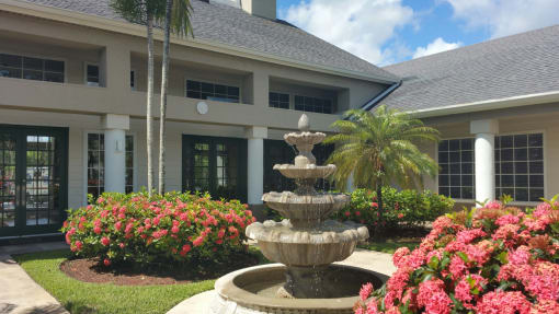 a fountain in front of clubhouse