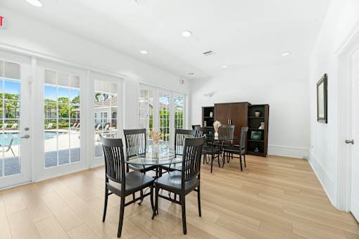 resident clubhouse with tables and chairs