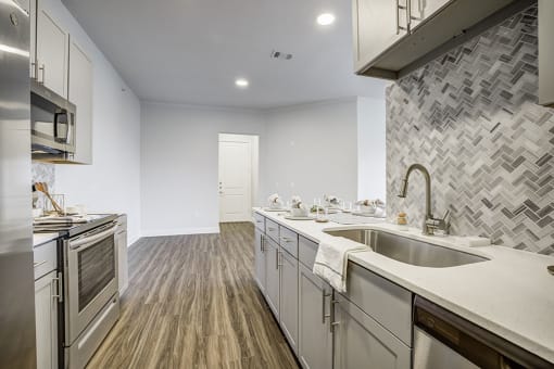 Fully Equipped Kitchen at 3500 Westlake Apartments, Greystar Real Estate, Austin, 78746
