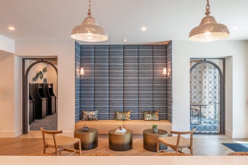 an image of a living room with lights and a table