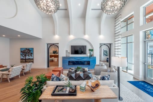 a living room filled with furniture and a fireplace