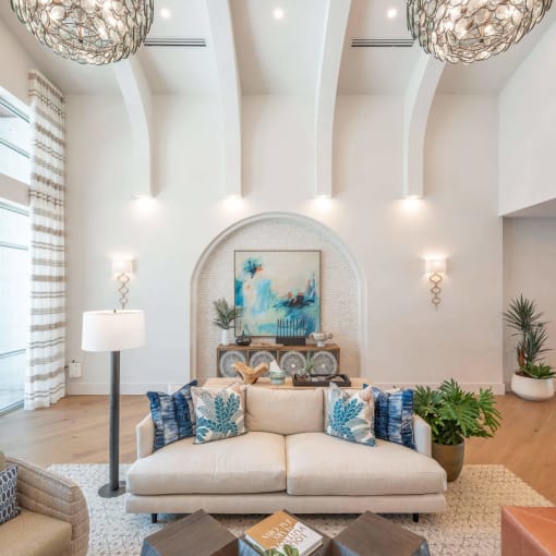 a living room with a couch and a table