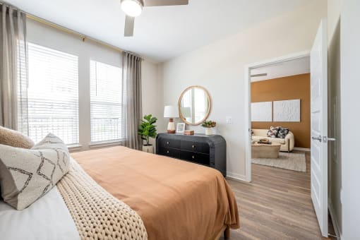 our apartments offer a bedroom with a large bed and a living room