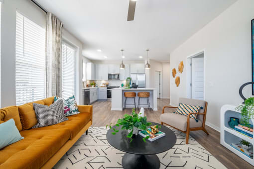a living room with a couch and a table