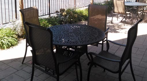 a table and chairs on a patio