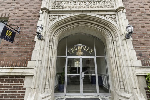 the entrance to the apartment building at Charbern Apartment Homes, Seattle, WA, 98122