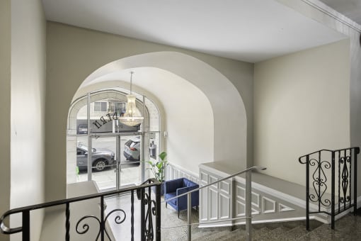 Property Entrance Stairs with Decorative Iron Railing at Charbern Apartment Homes, Seattle, WA, 98122