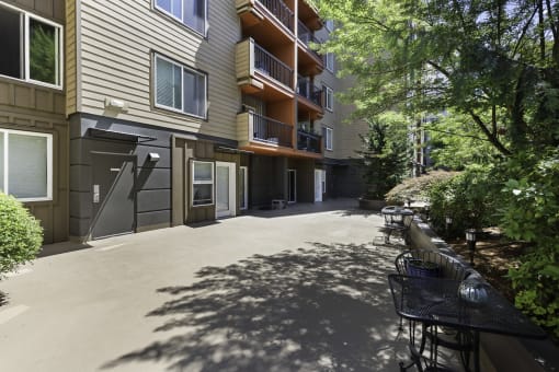Outdoor Area with views of unit balconies at Illumina Apartment Homes, Washington