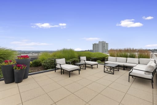 Cozy Seating Area on Rooftop Resident Lounge a view of the city at Villaggio Apartment Homes, Tacoma