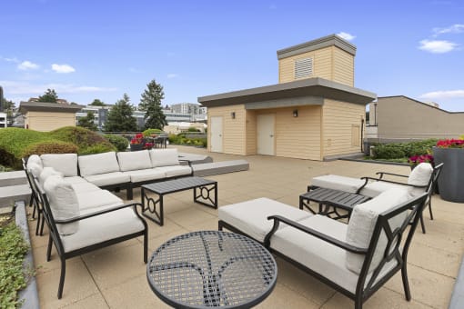 Rooftop Resident Lounge with cozy seating at Villaggio Apartment Homes, Washington