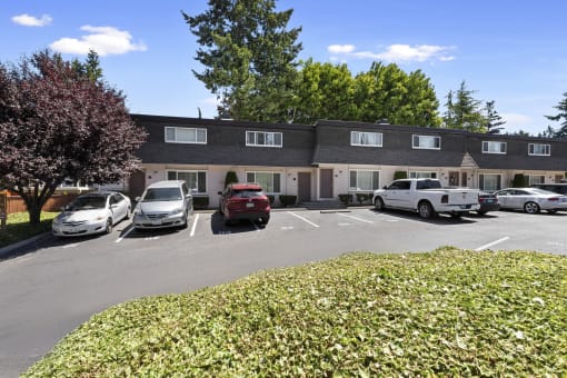 Resident Parking Area with Greenery and Trees at Woodlake Townhomes, Edmonds, Washington 98026