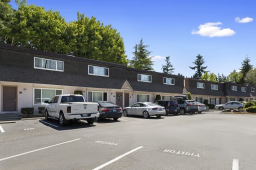 Resident Reserved parking lot in front of townhomes at Woodlake Townhomes, WA 98026
