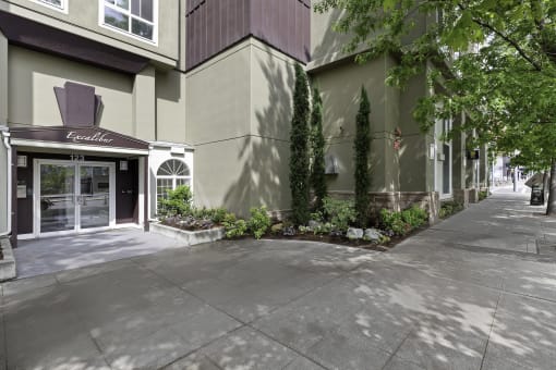 Front View of Apartment Building at Excalibur Apartment Homes, Bellevue, 98004
