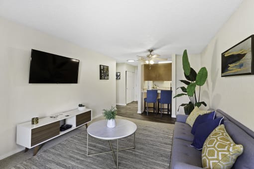 a living room with a couch and coffee table at Pacific Park Apartment Homes, Edmonds, 98026