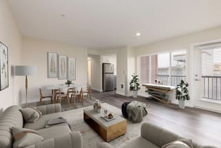 a living room with a couch and a table