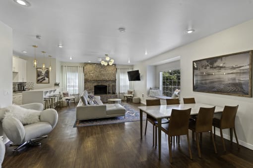 Wide Open, Furnished, Living Room with Plank Flooring, Ample Seating, and Luxurious Atmosphere at Serra Vista Apartment Homes, WA 98087