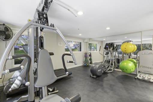 State-of-the-Art Fitness Center with a Variety of Exercise Equipment at Sir Gallahad Apartment Homes, Washington, 98004