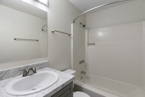 Bathroom with Sink and Shower with Tub at Swiss Gables Apartment Homes, WA 98032