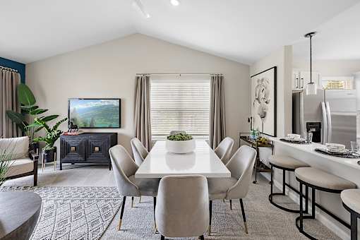 A modern dining room with a large table and chairs at Briarcliff Village, Michigan, 48390