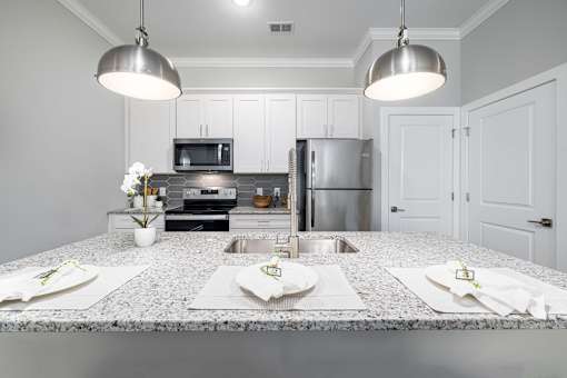 The Edwards Kitchen With Granite and Stainless countertops steel appliances at Griffin Weston, North Carolina