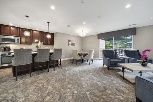 Living Room with a kitchen and a dining table at Amberly Apartments, West Bloomfield, 48322