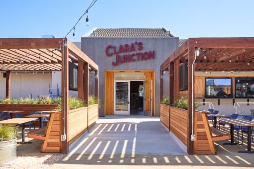 the exterior with tables and a patio at AVE Santa Clara, Santa Clara California