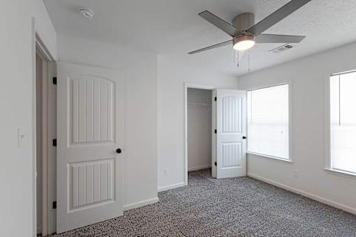 Carpeted bedroom at Sterlington Apartments, Grovetown, GA