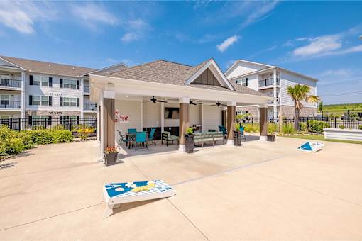 Cabana with cornhole boards at The Vista Apartments & Townhomes, Warrenville, South Carolina
