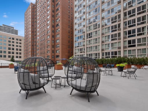 a group of chairs sitting on top of a building