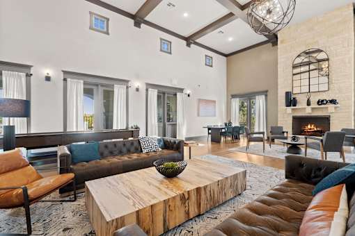 a living room with couches and a coffee table