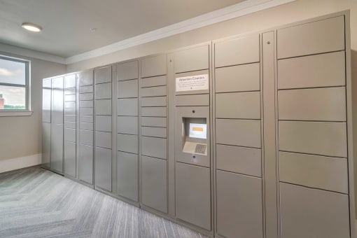 a row of lockers in a room with a window