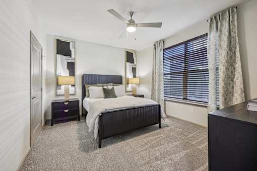 bedroom with nightstand at Vine + Vail Townhomes and Apartments, Texas, 76051