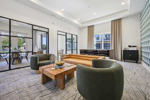 room with wooden coffee table at Vine + Vail Townhomes and Apartments, Grapevine, TX 76051