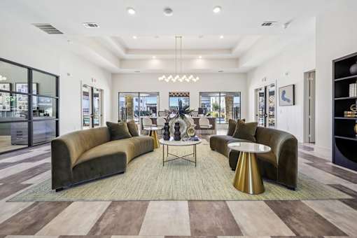 modern living room with sofa at Vine + Vail Townhomes and Apartments, Texas
