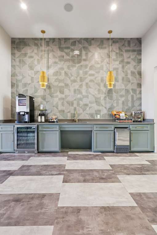 kitchen with a checkered floor at Vine + Vail Townhomes and Apartments, Grapevine